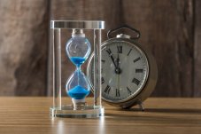 time-is-passing-blue-hourglass-close-up.jpg